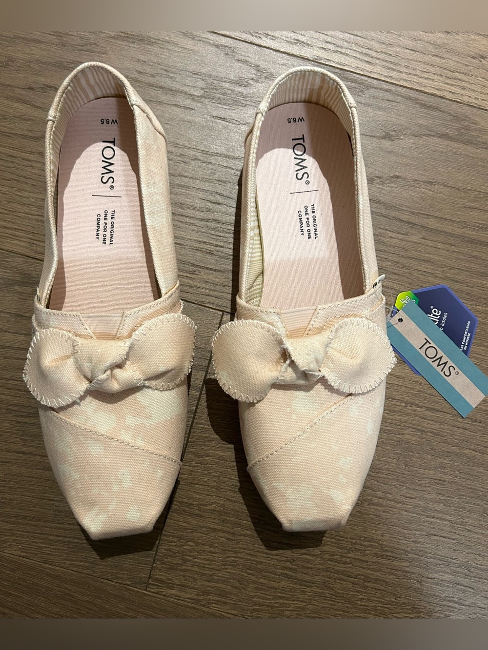 TOMS Women's Pale Pink Bow-Accent Canvas Slip-Ons